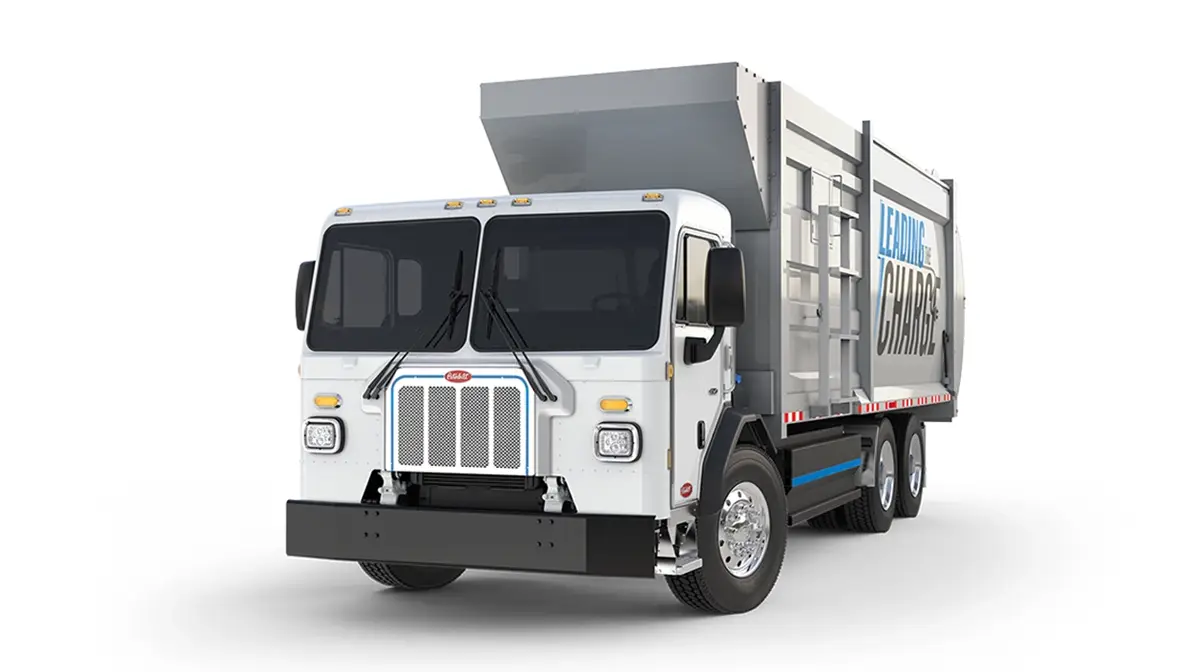 Peterbilt Model 520EV Electric White Truck with Silver Refuse Garbage Collection Body Isolated - Feature Image
